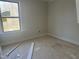Bedroom with one window and neutral color palette at 1448C Maplewood Dr, Durham, NC 27704