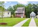 Quaint home with well-manicured lawn and new driveway at 1448C Maplewood Dr, Durham, NC 27704