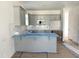 Well-lit kitchen featuring modern cabinets, countertop space, and stainless steel microwave at 1448C Maplewood Dr, Durham, NC 27704