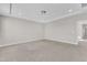 Spacious bedroom featuring plush carpeting and ample natural light from recessed lighting at 1776 Golden Honey Dr, Wake Forest, NC 27587