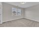 Well-lit bedroom features a large window at 1776 Golden Honey Dr, Wake Forest, NC 27587