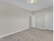 Neutral bedroom features carpet, base molding, and access to a closet or ensuite bathroom at 1776 Golden Honey Dr, Wake Forest, NC 27587