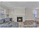 Cozy living room showcases a modern fireplace and comfortable seating arrangement at 1776 Golden Honey Dr, Wake Forest, NC 27587