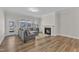 Inviting living room features a fireplace, hardwood floors, and ample natural light at 1776 Golden Honey Dr, Wake Forest, NC 27587