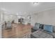 Open-concept living space flows into the kitchen with a view of the dining area at 1776 Golden Honey Dr, Wake Forest, NC 27587