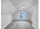 Cozy attic space, perfect for storage or a playroom, with natural light at 1908 Mystic Dr, Durham, NC 27712