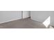 An empty bedroom with neutral walls and flooring, with light coming in through a window at 2105 Attend Xing, Fuquay Varina, NC 27526