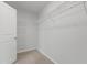 A walk-in closet with installed wire shelving provides ample storage at 2105 Attend Xing, Fuquay Varina, NC 27526