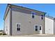 Back of house featuring simple siding, door and windows at 2105 Attend Xing, Fuquay Varina, NC 27526