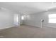 Spacious loft area with neutral carpet, light gray walls, and a window with natural light at 2105 Attend Xing, Fuquay Varina, NC 27526