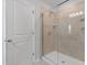 This bathroom features a shower with a glass door and tiled surround at 2105 Attend Xing, Fuquay Varina, NC 27526