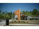 Exterior view of the Knightdale Station Park sign and covered picnic area on a sunny day at 215 Sallinger St, Knightdale, NC 27545