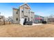 Backyard with patio, hot tub, and grill, creating an inviting outdoor entertainment area at 244 W Copenhaver Dr, Clayton, NC 27527