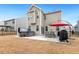 Backyard with a patio, hot tub, and dining set, ideal for outdoor relaxation and entertaining at 244 W Copenhaver Dr, Clayton, NC 27527