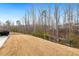 Expansive backyard with well-maintained lawn and a fence, offering privacy and space at 244 W Copenhaver Dr, Clayton, NC 27527