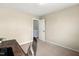 Bedroom features a neutral color scheme and versatile workspace with a dark wood desk at 244 W Copenhaver Dr, Clayton, NC 27527