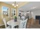 Open-concept dining room with kitchen view, great for easy entertaining and everyday living at 244 W Copenhaver Dr, Clayton, NC 27527