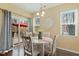 Bright dining area with patio access and a view of the outdoor living space at 244 W Copenhaver Dr, Clayton, NC 27527