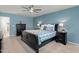 Comfortable main bedroom with an en-suite sitting area and stylish furnishings at 244 W Copenhaver Dr, Clayton, NC 27527