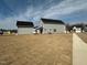 Spacious backyard with newly installed grass, perfect for outdoor activities and relaxation at 30 Nimble Way # 171, Clayton, NC 27520