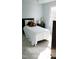 Bright bedroom with neutral walls, plush carpeting, and a cozy bed, creating a welcoming space at 3109 Benton Cir, Raleigh, NC 27615