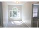 Bright bedroom featuring a window with natural light and neutral carpeting at 3109 Benton Cir, Raleigh, NC 27615