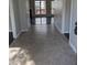 Inviting entryway featuring tiled floors, neutral paint, and a view into the living area at 3109 Benton Cir, Raleigh, NC 27615