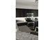 Stylish kitchen with granite countertops, stainless steel appliances, and dark cabinetry at 3109 Benton Cir, Raleigh, NC 27615