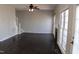 Spacious living area featuring hardwood floors, a fireplace, and staircase access at 3109 Benton Cir, Raleigh, NC 27615