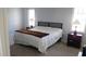 Relaxing bedroom with two bedside tables and lamps flanking the bed at 3109 Benton Cir, Raleigh, NC 27615