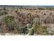 Overhead view of a secluded home site with mature trees and a driveway at 3741 Manly Farm Rd, Wake Forest, NC 27587