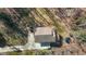 Bird's eye view of a home showing a long driveway and wooded backyard at 3741 Manly Farm Rd, Wake Forest, NC 27587
