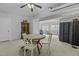 Finished basement area with carpet, table and chairs, and ceiling fan at 3741 Manly Farm Rd, Wake Forest, NC 27587