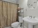 Cozy bathroom featuring a pedestal sink and shower at 3741 Manly Farm Rd, Wake Forest, NC 27587