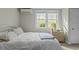 Bedroom featuring neutral colors, ample lighting, and a window at 3741 Manly Farm Rd, Wake Forest, NC 27587