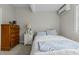 Cozy bedroom with white linens, dresser, and ample natural light at 3741 Manly Farm Rd, Wake Forest, NC 27587