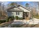 Charming home featuring a covered front porch with natural wood at 3741 Manly Farm Rd, Wake Forest, NC 27587