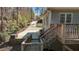 Backyard view with wooden deck and a pathway leading to the house at 3741 Manly Farm Rd, Wake Forest, NC 27587
