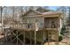 Exterior angle of home featuring a spacious wooden deck at 3741 Manly Farm Rd, Wake Forest, NC 27587