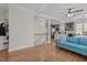 Open-concept living room with hardwood floors and a view to the kitchen at 3741 Manly Farm Rd, Wake Forest, NC 27587