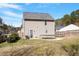 The backyard features a trampoline, a patio, and a fence at 40 Golden Timber Cir, Four Oaks, NC 27524