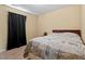 This bedroom features carpet, a window, and neutral-colored walls at 40 Golden Timber Cir, Four Oaks, NC 27524