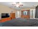 Bedroom with carpet, ceiling fan, and closet at 40 Golden Timber Cir, Four Oaks, NC 27524