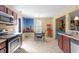 Open dining area adjacent to the kitchen with table and chairs at 40 Golden Timber Cir, Four Oaks, NC 27524