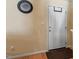 A bright entryway with hardwood floors, neutral walls, and a modern clock at 40 Golden Timber Cir, Four Oaks, NC 27524