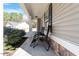 Relaxing front porch space with seating, perfect for enjoying the outdoors at 40 Golden Timber Cir, Four Oaks, NC 27524