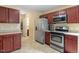 Kitchen featuring stainless steel appliances, including a refrigerator, oven, and microwave at 40 Golden Timber Cir, Four Oaks, NC 27524