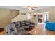 Open living area with a sofa, access to the kitchen, and views of the dining area at 40 Golden Timber Cir, Four Oaks, NC 27524