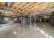 Unfinished basement featuring exposed ceiling and concrete walls at 405 Lookout Pt, Rougemont, NC 27572