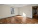 Bedroom featuring hardwood floors, a neutral color scheme, and a window for natural light at 405 Lookout Pt, Rougemont, NC 27572